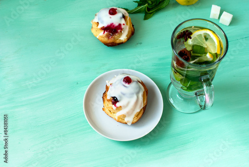 tea with mint, lemon, cinnamon stick and cardamom and cheese muf photo