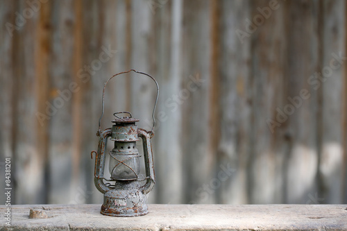 Old metallic rusty kerosene lamp