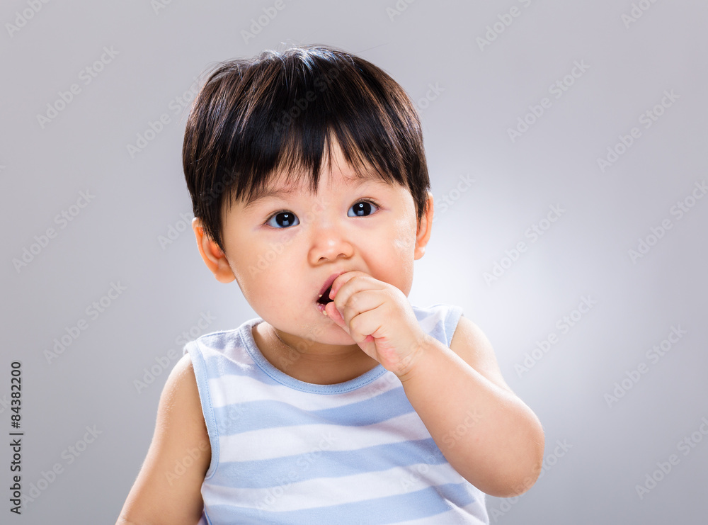 Little baby boy having his cookie Little baby boy having his cookie