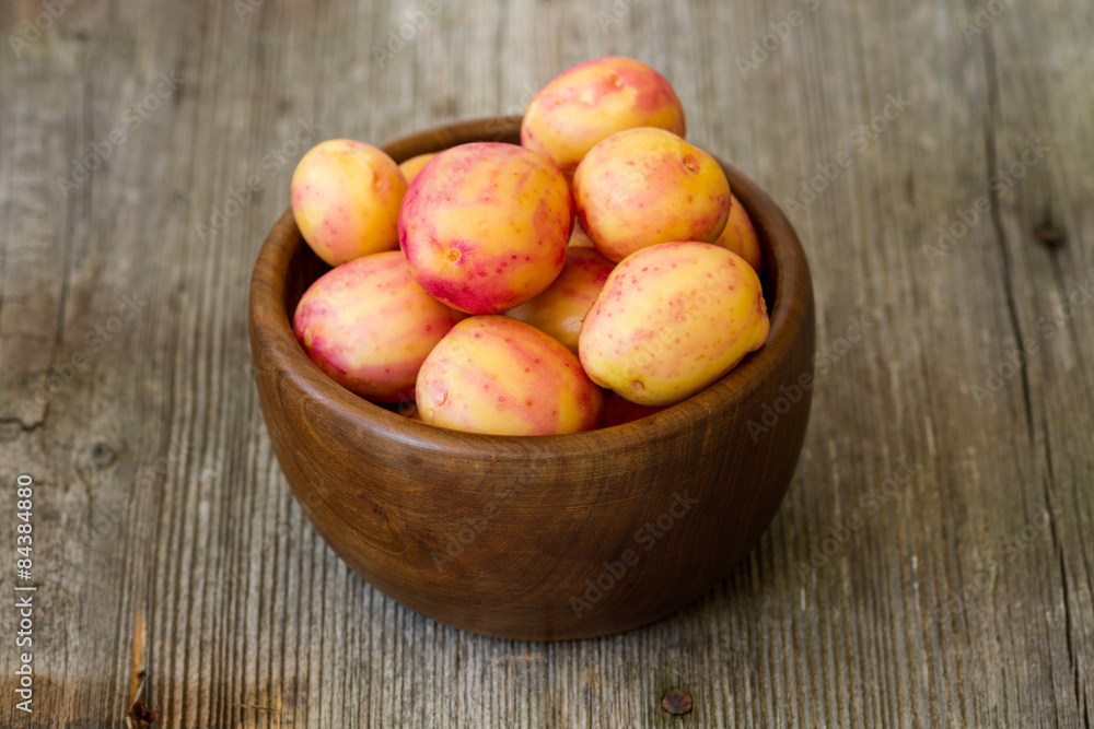 new red potatoes on wood new red potatoes on wood
