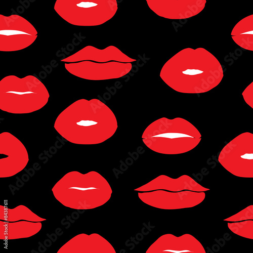 Seamless vector background with female lips.