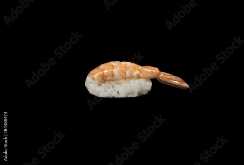 Shrimp sushi closeup isolated on black background