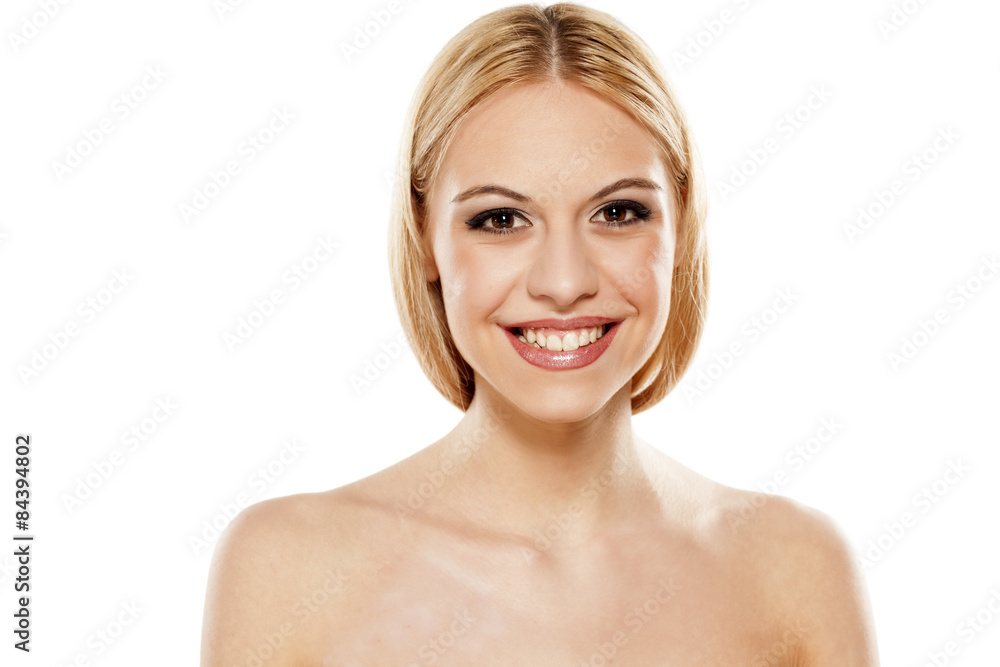 smiling beautiful young woman on a white background smiling beautiful young woman on a white background