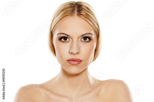 portrait of a beautiful young woman on white background