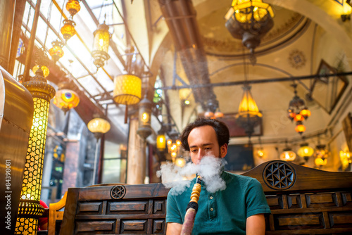 Photography Man smoking turkish hookah