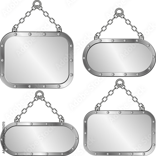 set of isolated metal plaques hanging on a chain