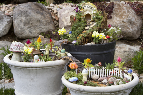 Fairy garden in a flower pot outdoors