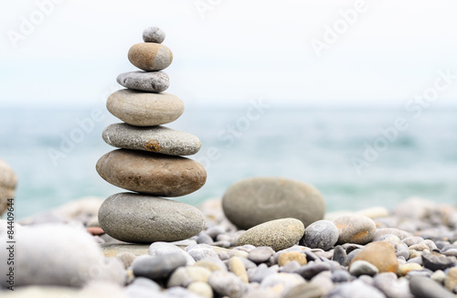 Round Smooth Stones Stacked on Rocky Beach