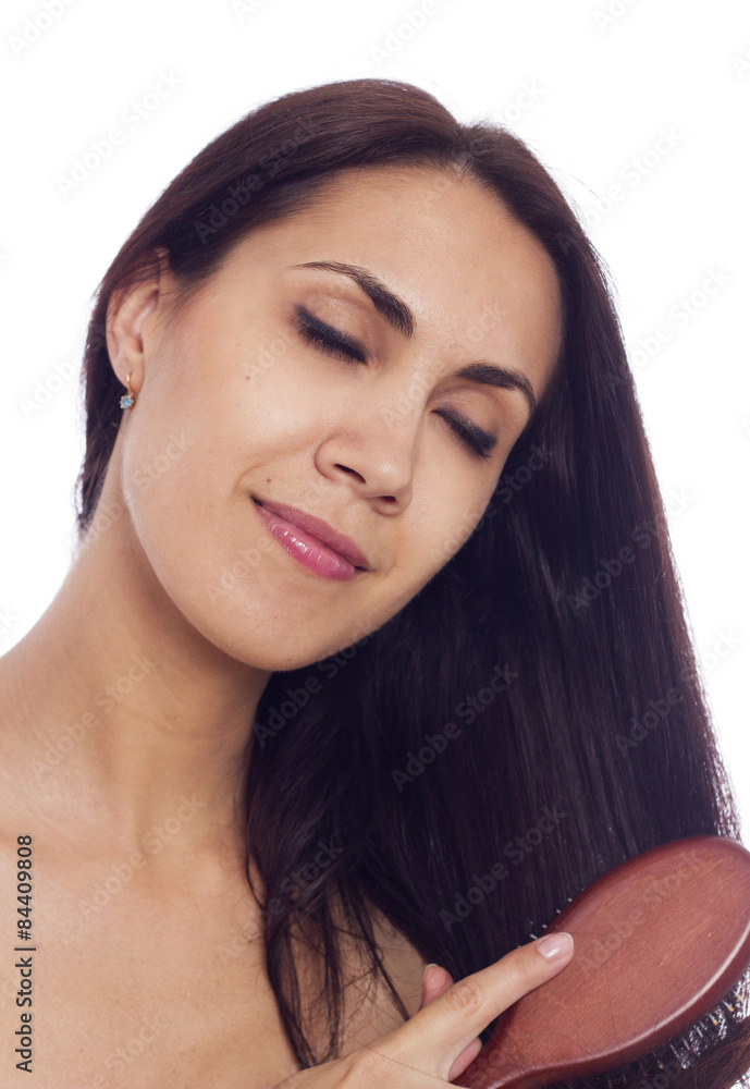 Fototapeta premium Woman with comb in her hands