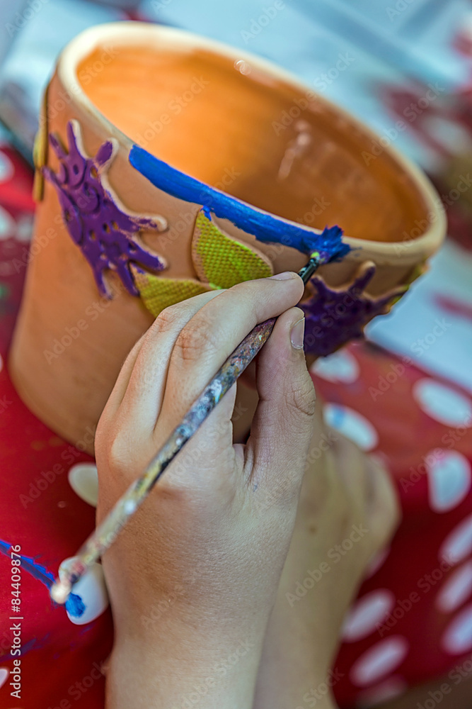 Children painting pottery 18
