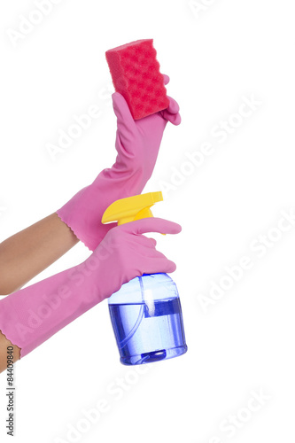Hands holding sprayer and cleaning sponge