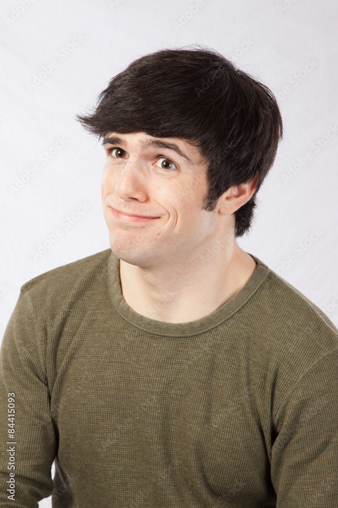 Handsome man smiling a happy smile Handsome man smiling a happy smile