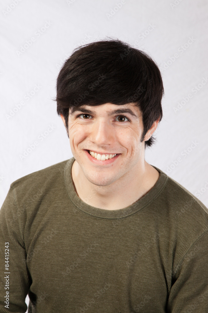 Handsome man smiling a happy smile Handsome man smiling a happy smile