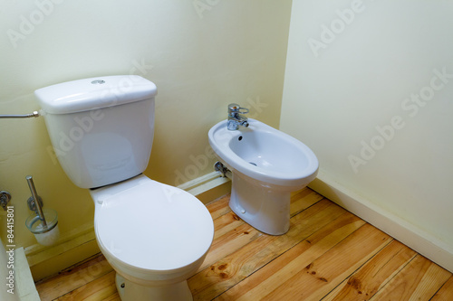 white porcelain bidet and toilet wc.
