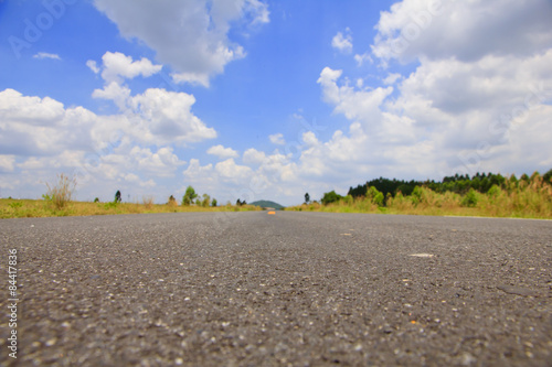 Stock Photo - Road and cloud on blue sky.