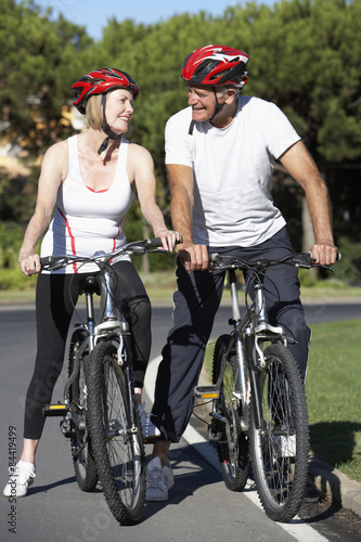 Senior Couple On Cycle Ride Together