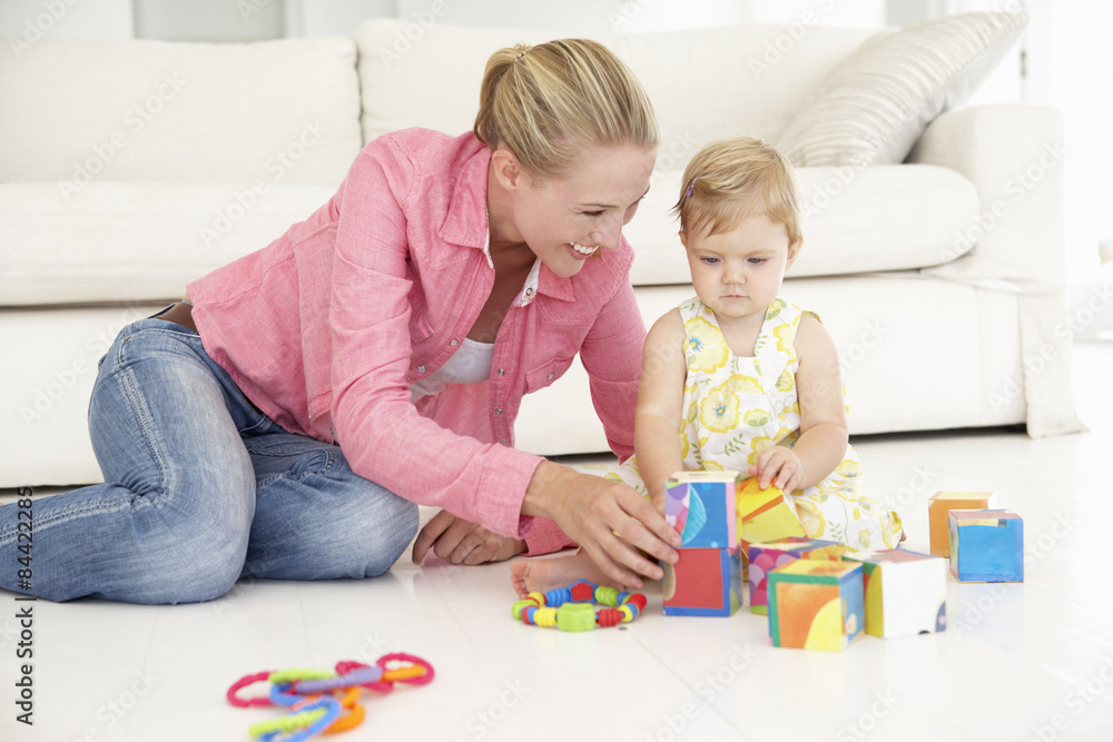 Mother and Daughter Pplaying Together At Home Mother and Daughter Pplaying Together At Home