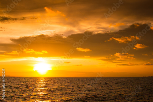 Beautiful sunset over the sea  orange color filtered effect
