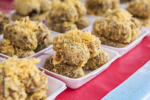 Thai dessert called “Khao Mao Tod” Deep-fried Bananas with Coconut