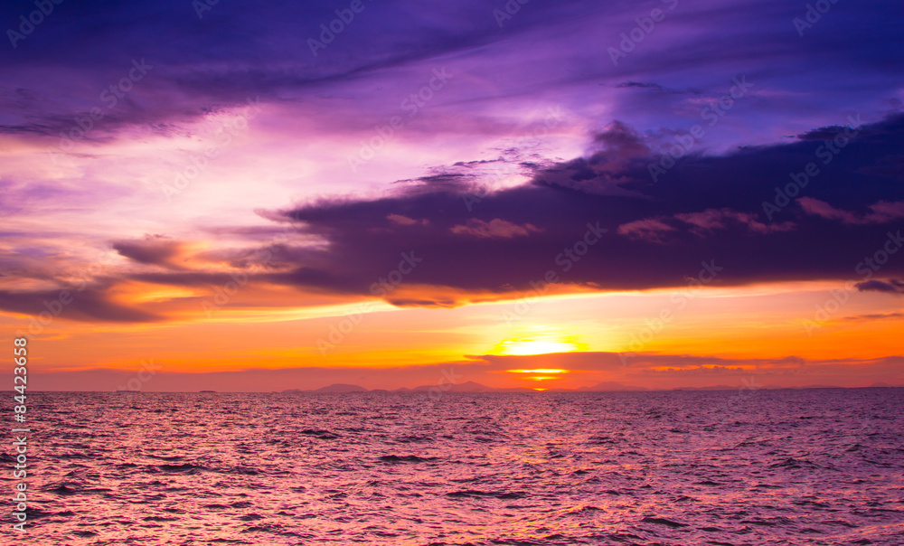 Beautiful sunset over the sea, purple color filtered effect