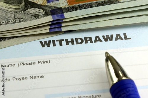 Withdrawal slip from bank checking or savings account - Finance and accounting concept