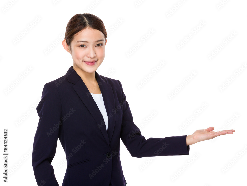 Asian businesswoman with open hand palm Asian businesswoman with open hand palm