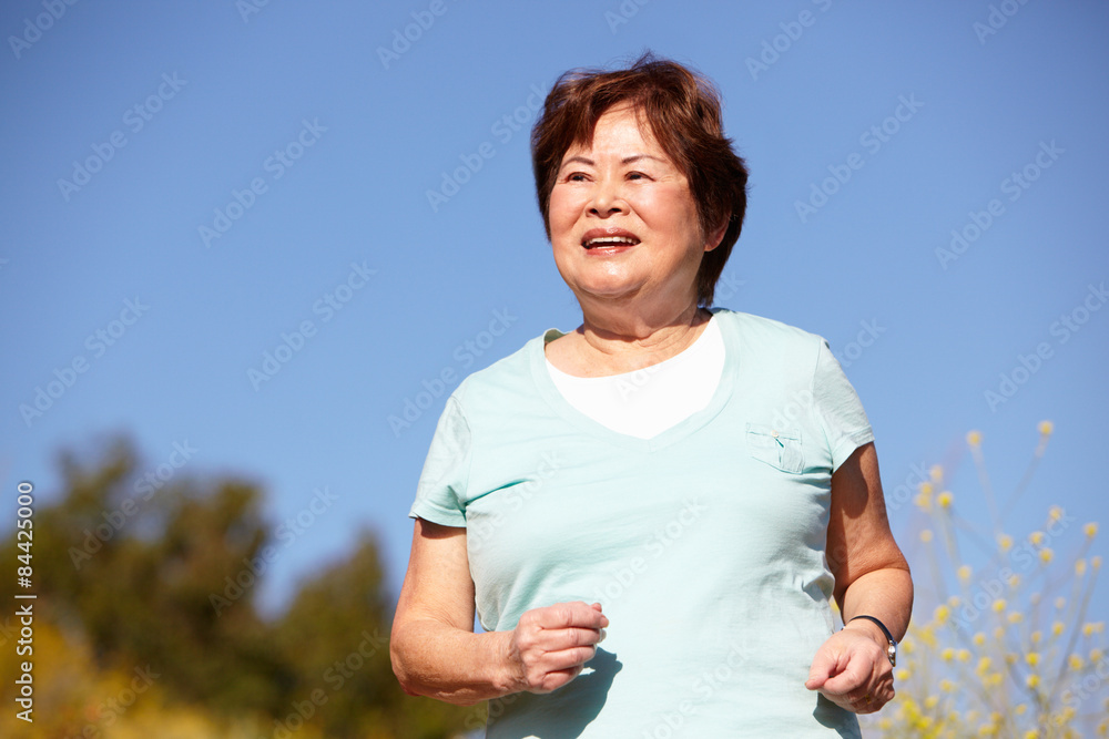 Senior woman jogging Senior woman jogging