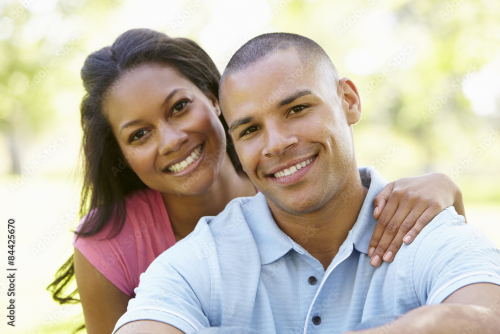 Portrait Of Romantic Young African American Couple In Park Portrait Of Romantic Young African American Couple In Park