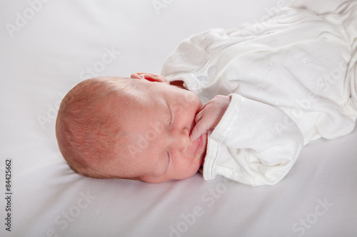 Newborn baby peacefully sleeping