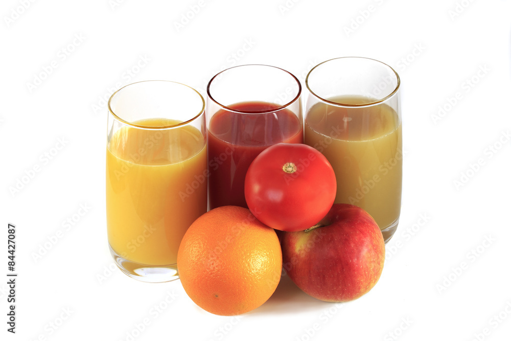 Three glasses with juice,tomato, orange, apple Three glasses with juice,tomato, orange, apple