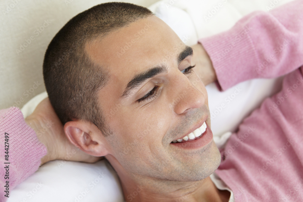 Young Man Relaxing On Bed Young Man Relaxing On Bed
