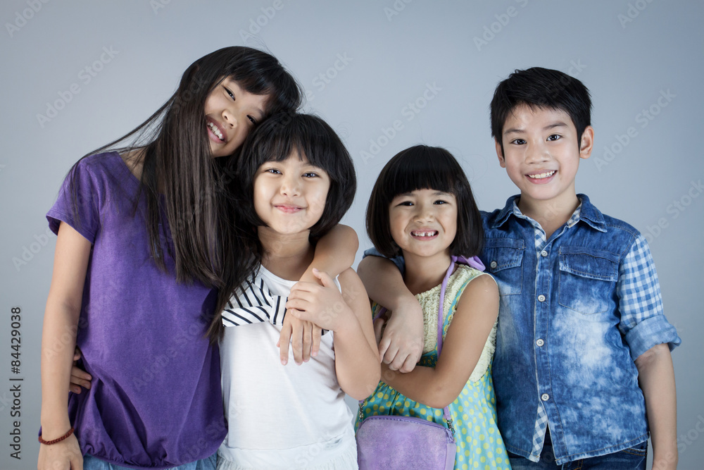 Group of Happy asian child on gray background Group of Happy asian child on gray background