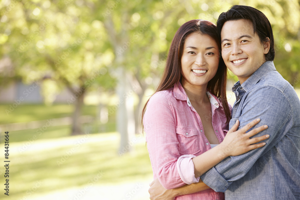 Romantic portrait Asian couple in park Romantic portrait Asian couple in park