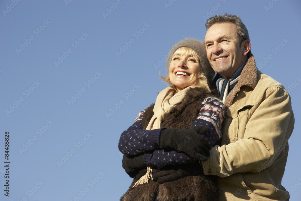 Portrait mature couple outdoors in winter Portrait mature couple outdoors in winter