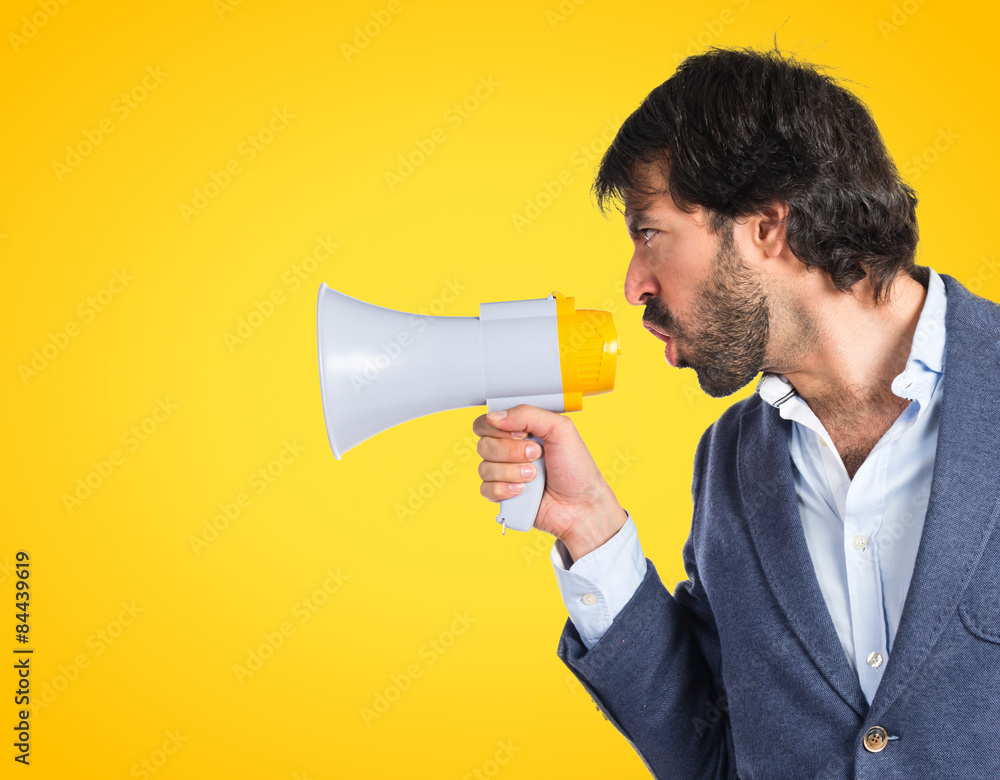 Businessman shouting over isolated white background Businessman shouting over isolated white background