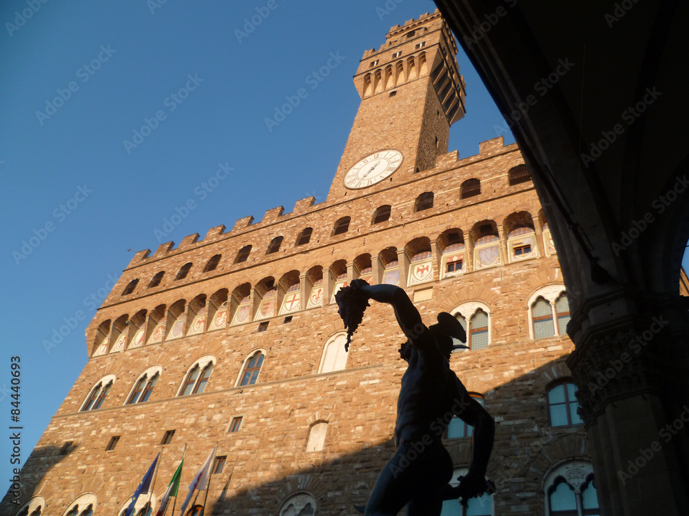 Florence, Italy. Palazzo vecchio and Benvenuto Cellini statue
