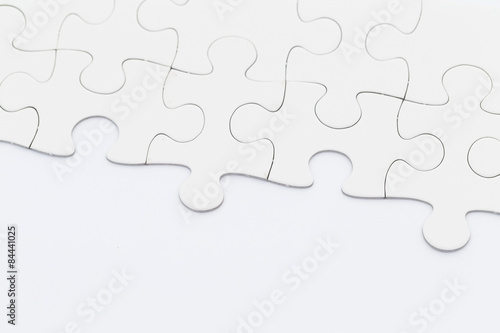White puzzle on blank paper