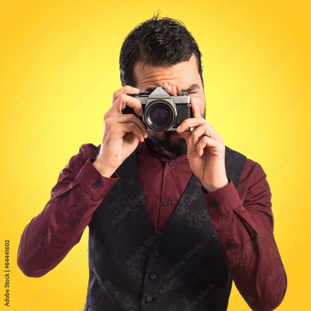 Man wearing waistcoat photographing Man wearing waistcoat photographing