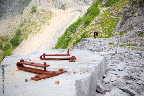 Tools of miners embedded in a block of marble in the quarry