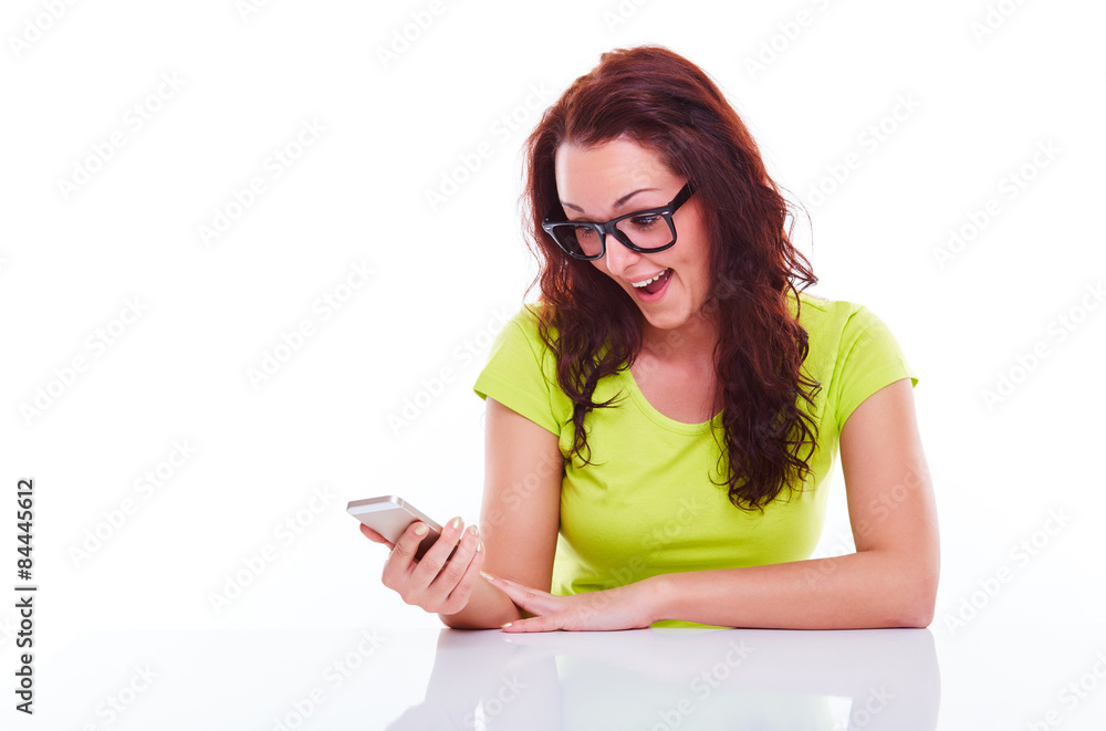 Woman writing sms on mobile phone Woman writing sms on mobile phone