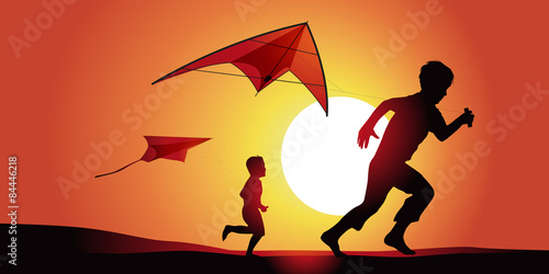 Cerf volant enfants-couche de soleil