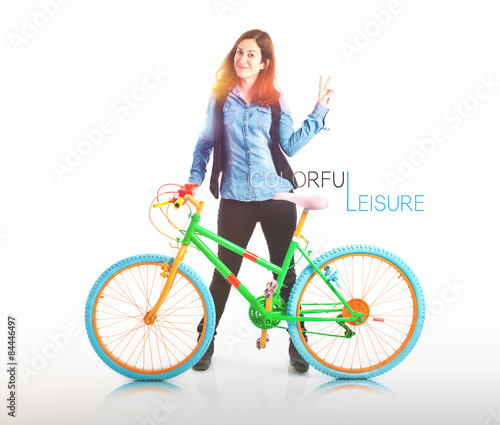 Woman with her colorful bicycle