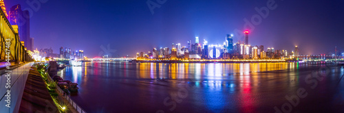 Fototapeta Naklejka Na Ścianę i Meble -  illuminated skyline of chongqing at riverbank