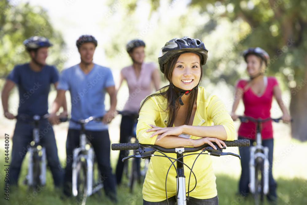 Fototapeta premium Group Of Young Friends On Cycle Ride In Countryside
