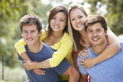 Group Of Young Friends Having Fun In The Countryside