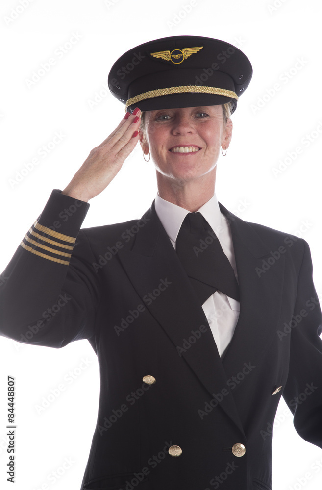 Senior airline pilot in uniform saluting American style salute Senior airline pilot in uniform saluting American style salute