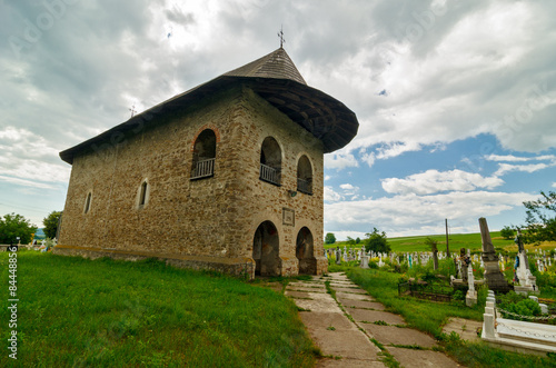 The church of All Saints in the graveyard of the village of Parhauti, Romanian Moldavia,1522 AC. photo