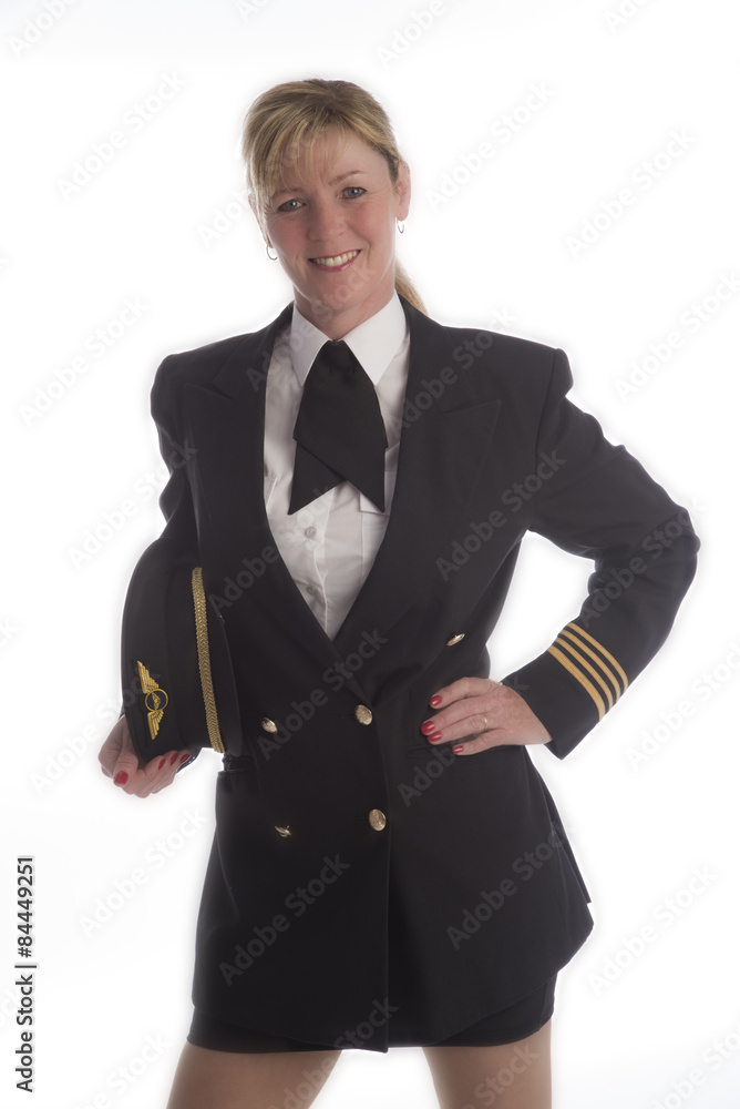 Senior female airline pilot in uniform in a short skirt Stock Photo Adobe Stock
