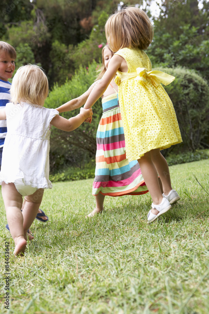Fototapeta premium Group Of Children Playing Outdoors Together