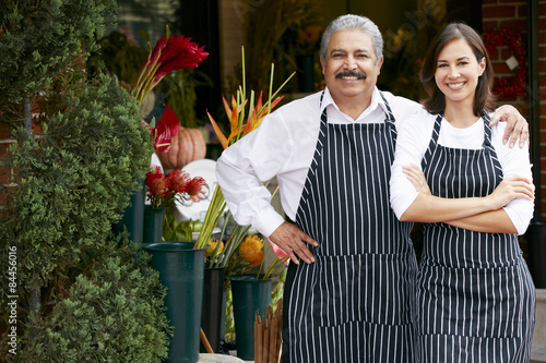 Portrait Of Male And Female Florist Outside Shop